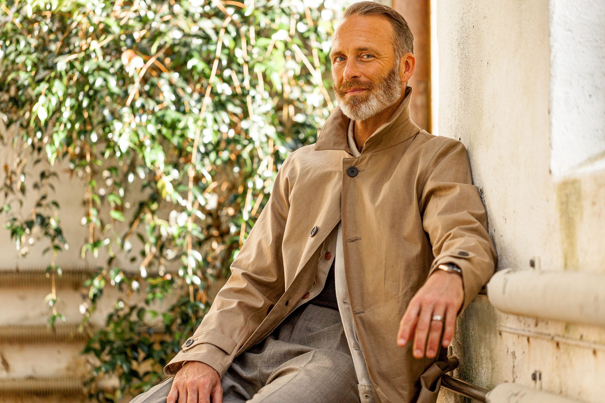 Henrik Bratt in Beige Linen Laminar Coat by Herno Landscape